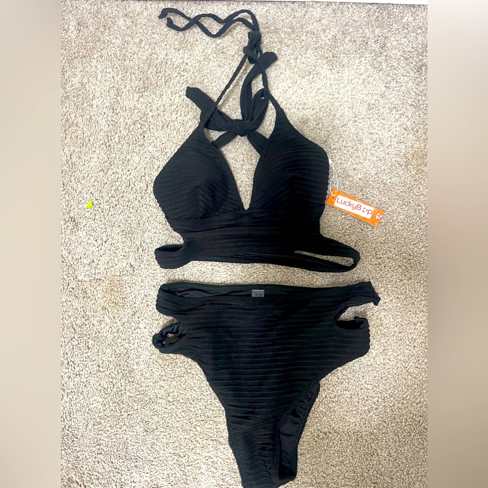 Women’s bikini brand new, never worn. Tags & hygiene protection on